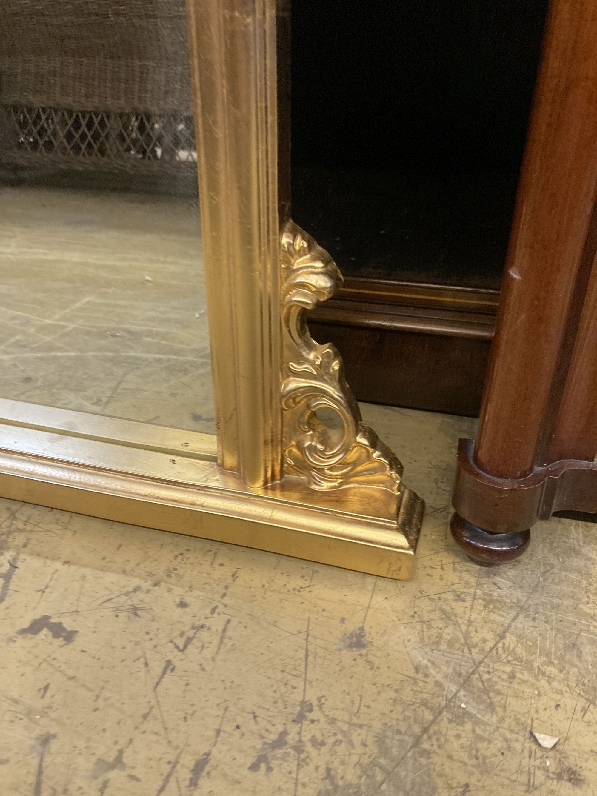 A Victorian mahogany overmantel mirror, width 102cm, height 71cm, together with a reproduction gilt framed overmantel mirror